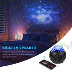 Starlight Galaxy Projector filling a bedroom ceiling with stars, played from a phone