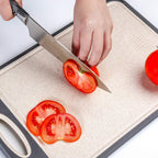 Slicing tomatoes on the cutting board